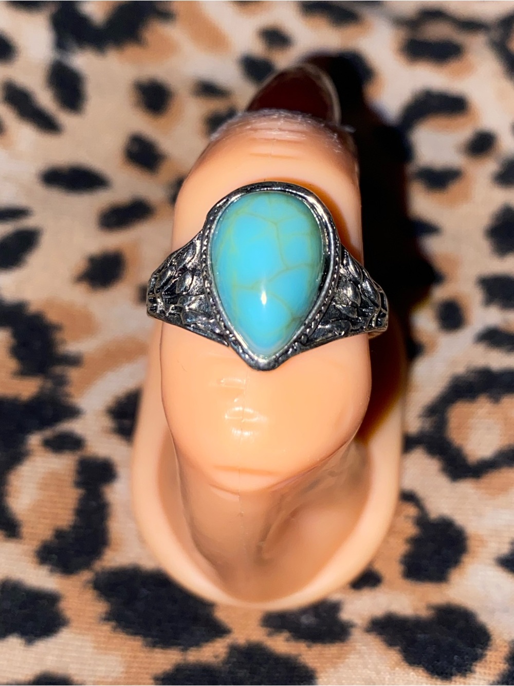 Blue turquoise ring with silver filigree detailing